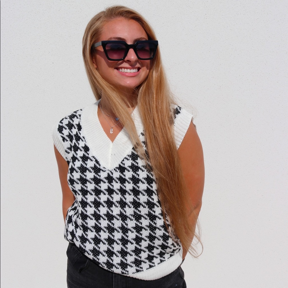 Black and white sweater vest